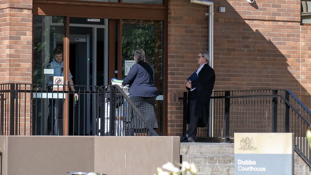 Crown prosecutor Liam Shaw (right) outside Dubbo Court as he prepared to finish his closing address. Picture by Belinda Soole