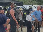 A smiling Chris Hemsworth endured the gruelling Northern Territory heat on the set of his latest show which was filmed in Katherine.