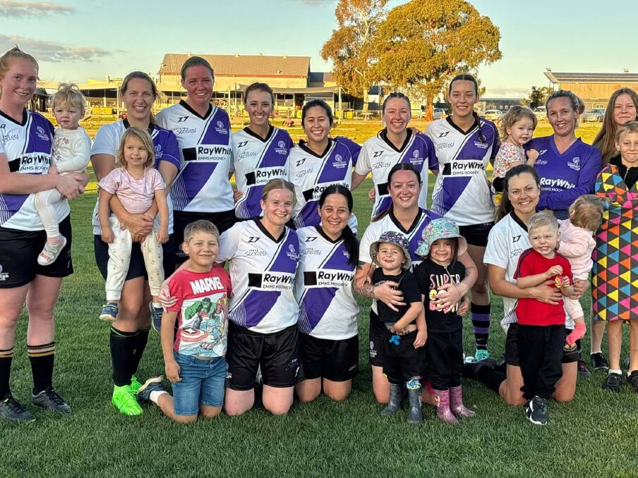Cowra Women's Soccer side with their biggest supporters