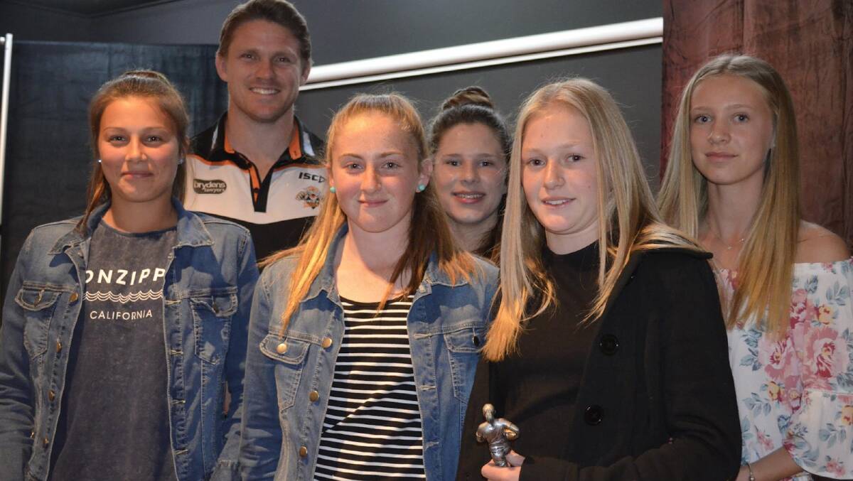 Cowra Junior League's league tag side award winners pictured with Wests Tiger Chris Lawrence.