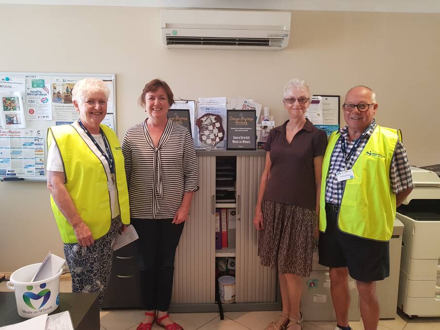 Deserving winners: (From left) Yvonne Antaw, Jenny Bell, Jan Nilsen and David Antaw get ready to make meal deliveries.