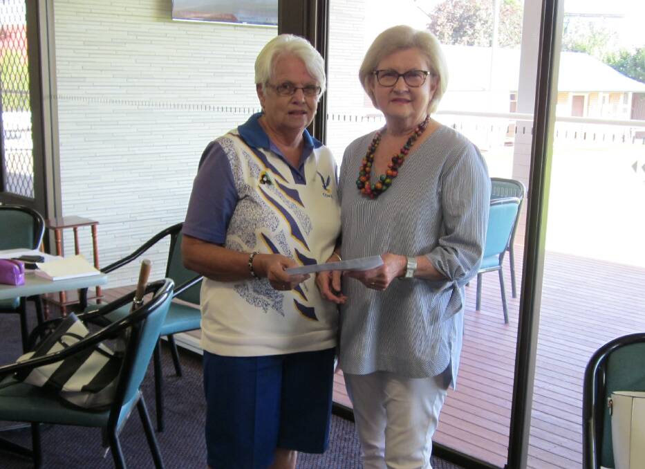 Cowra Womens' Bowls President Joanne Bailey and representative of the Cowra Cancer Action Group, Peggy Chivers, at the presentation of the cheque.