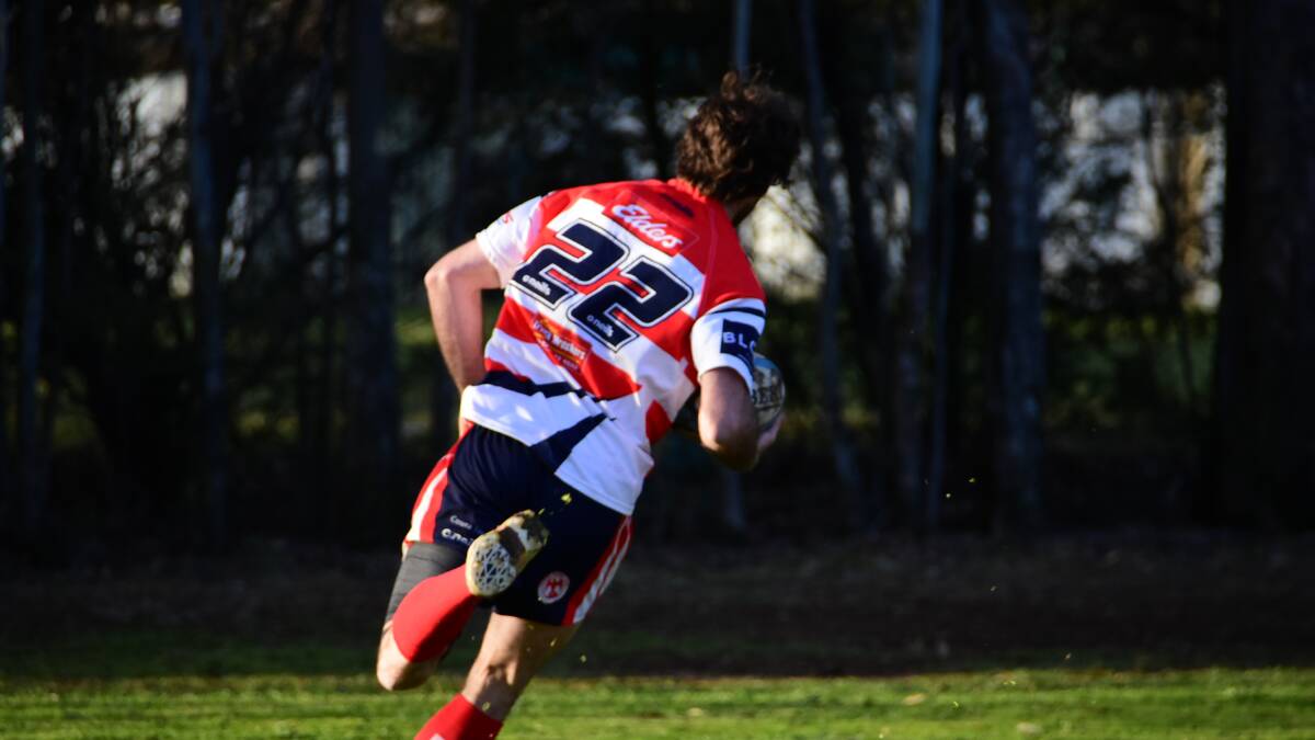 Elliot Brice makes a game-breaking try in Cowra's Blowes Clothing Cup semi-final win against Forbes. Photo: Ben Rodin