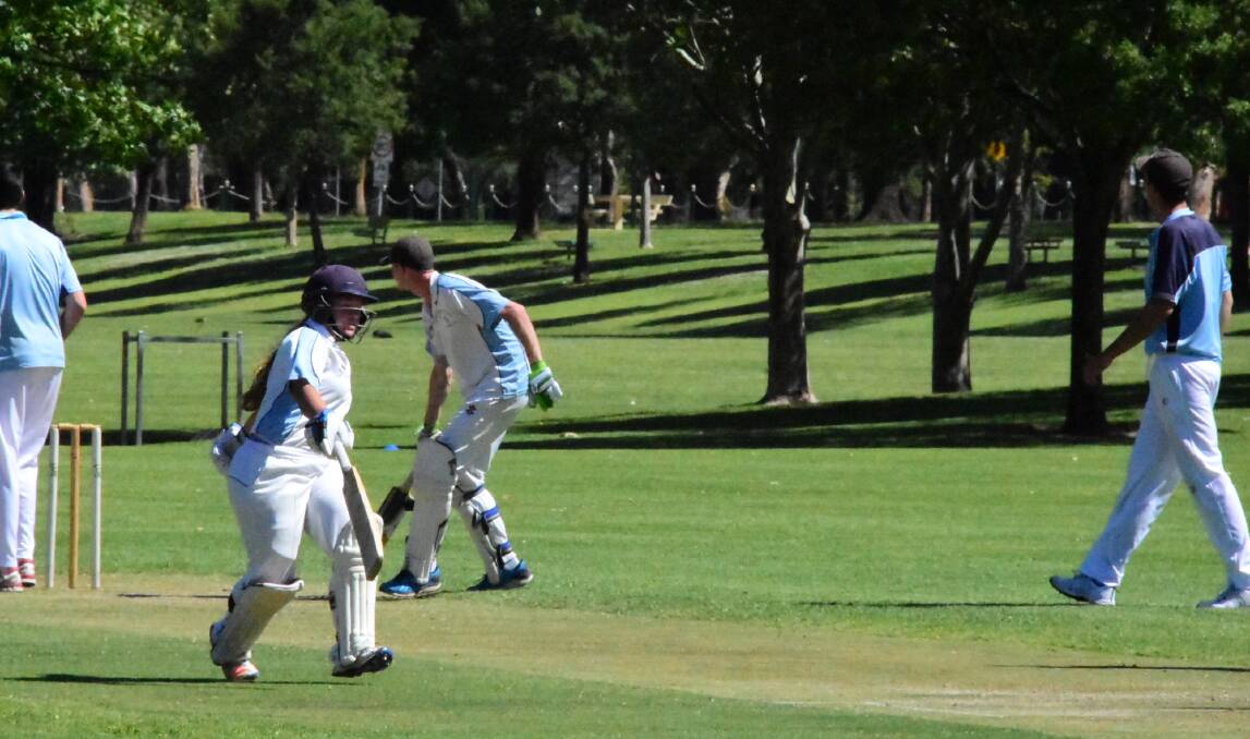 Lani Ryan runs between the wicket during the Cowra Bowling Club's narrow loss to Grenfell in the Sportspower Cup on the weekend. Photo: Ben Rodin