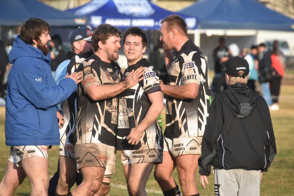 Caley Mok and Ronald Lawrence celebrate last year's semi-final win, but Mok has emphasised that the group has moved on since last year's finals campaign. Photo: Nick McGrath