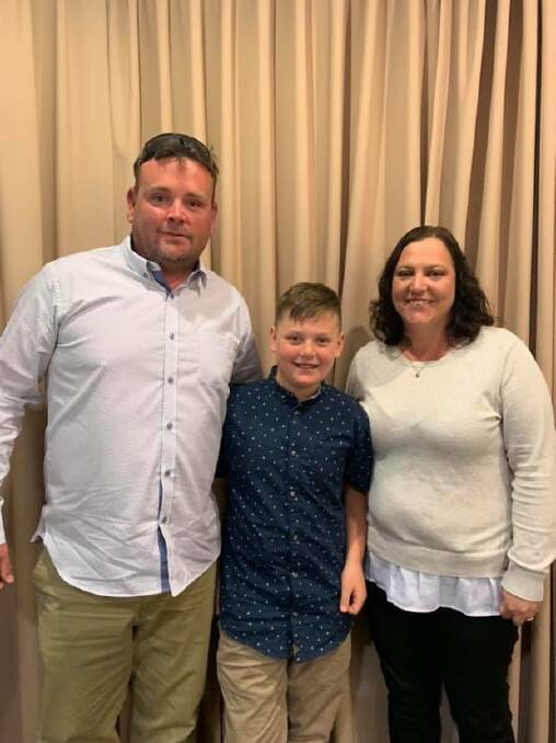 The Cowra Blues' Aaron Hall (centre) finished runner-up in the AFL Central West under 12s best and fairest count. Photo supplied courtesy of the Cowra Blues.
