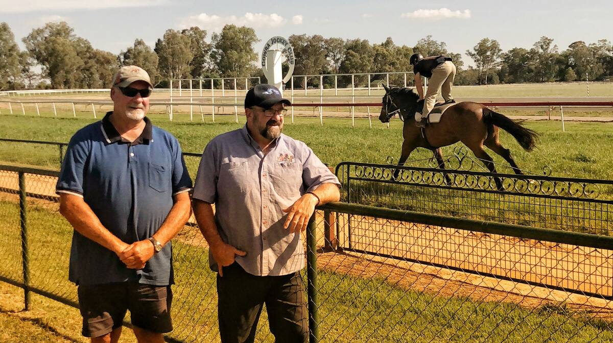 Track Manager Barry Wall and Cowra Jockey Club President Peter Ford inspect the track conditions for Saturday's meet at the Cowra Racecourse, which will feature two runners from local trainer Danny Parsons. 