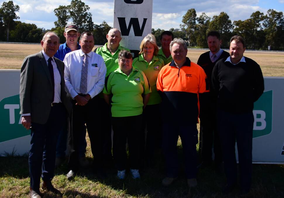 Members of the Cowra Harness Racing Club with the representatives of this year's race sponsors, including Waugoola Motors, Cowra Services Club, Cowra Bowling Club, Lachlan River Produce, Power Tools Plus and Cowra Shire Council.