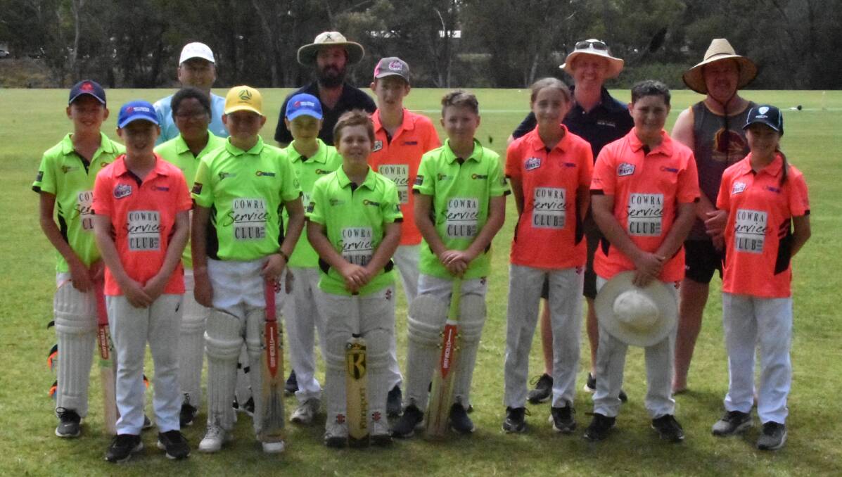 Services Club general manager Lloyd Garratt (rear left) with members of the Cowra District Junior Cricket community last Saturday morning at Raudonikus Oval. Photo: Ben Rodin