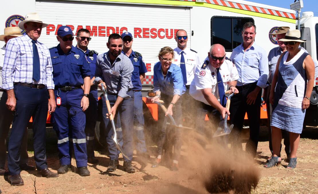  Senior Project Director Anthony Dimech, Member for Cootamundra Steph Cooke and NSW Ambulance's Central West Zone Manager Ron Gavin turn the sod. Photo: Ben Rodin 