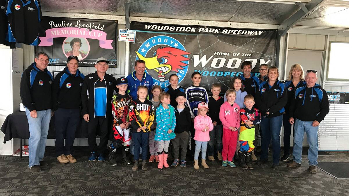 Paul Caslick and Cowra MRC Club Officials with some of the kids who took part in the Minibike Heroes Fun Day.