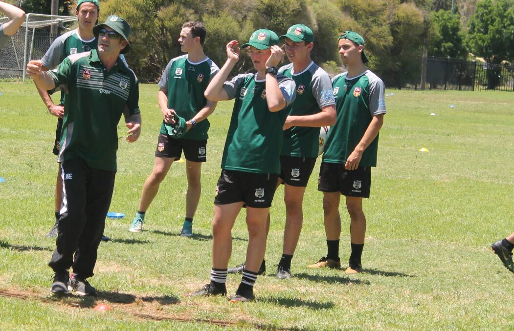 ON DECK: Tony Woolnough takes his group of under 16s through their paces at Wellington High School on the weekend. Photo: WESTERN RAMS