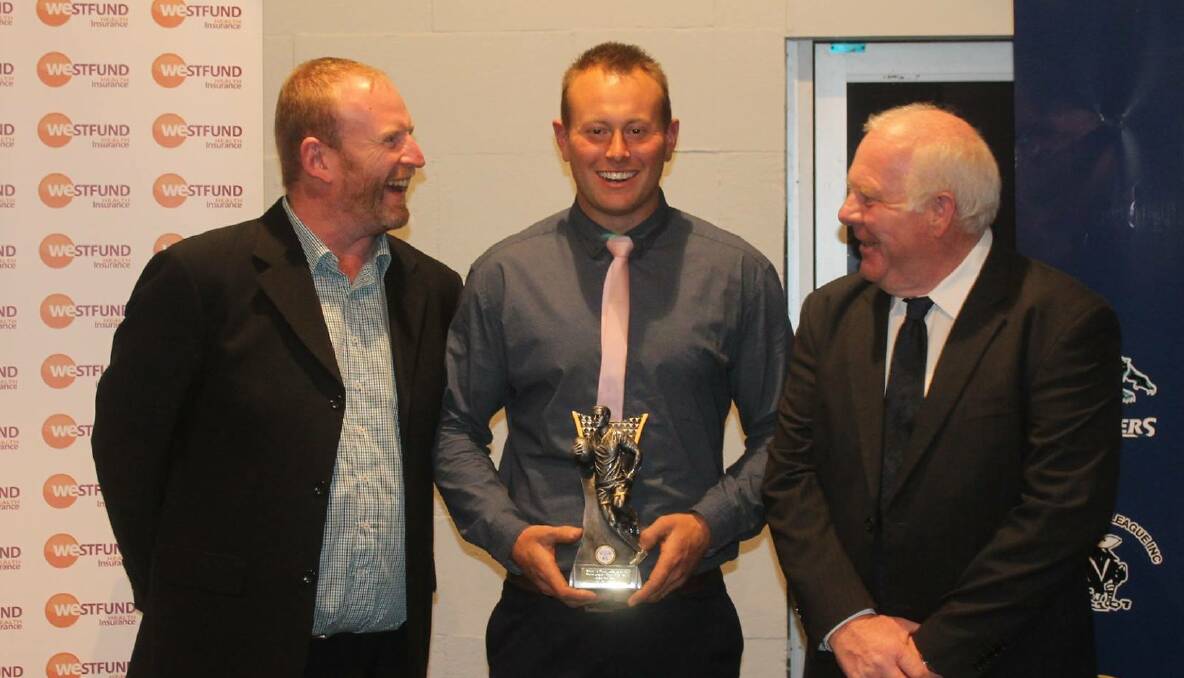ALL SMILES: Cowra skipper Josh Rainbow (centre) with the Group 10 player of the year trophy. Photo: WESTERN RAMS