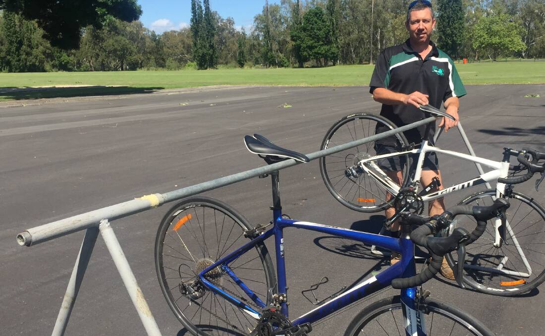 Cowra Triathlon Club president Glen Hudson with some of the bikes the club has available for anyone wanting to race who doesn't own a road bike.