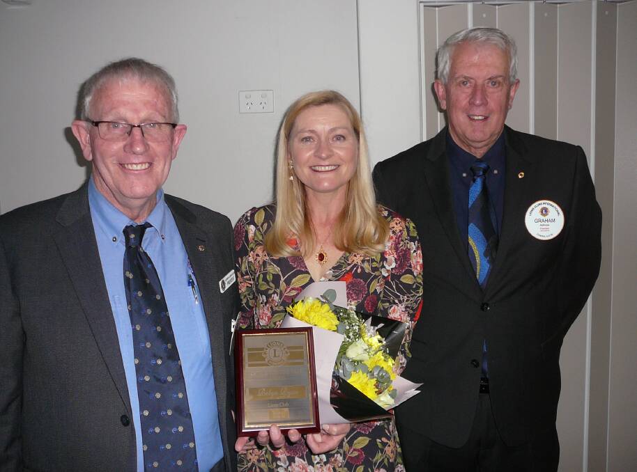 Lions Citizen of the Year Robyn Ryan with Lions Ian Acret (L) and Graham Apthorpe.