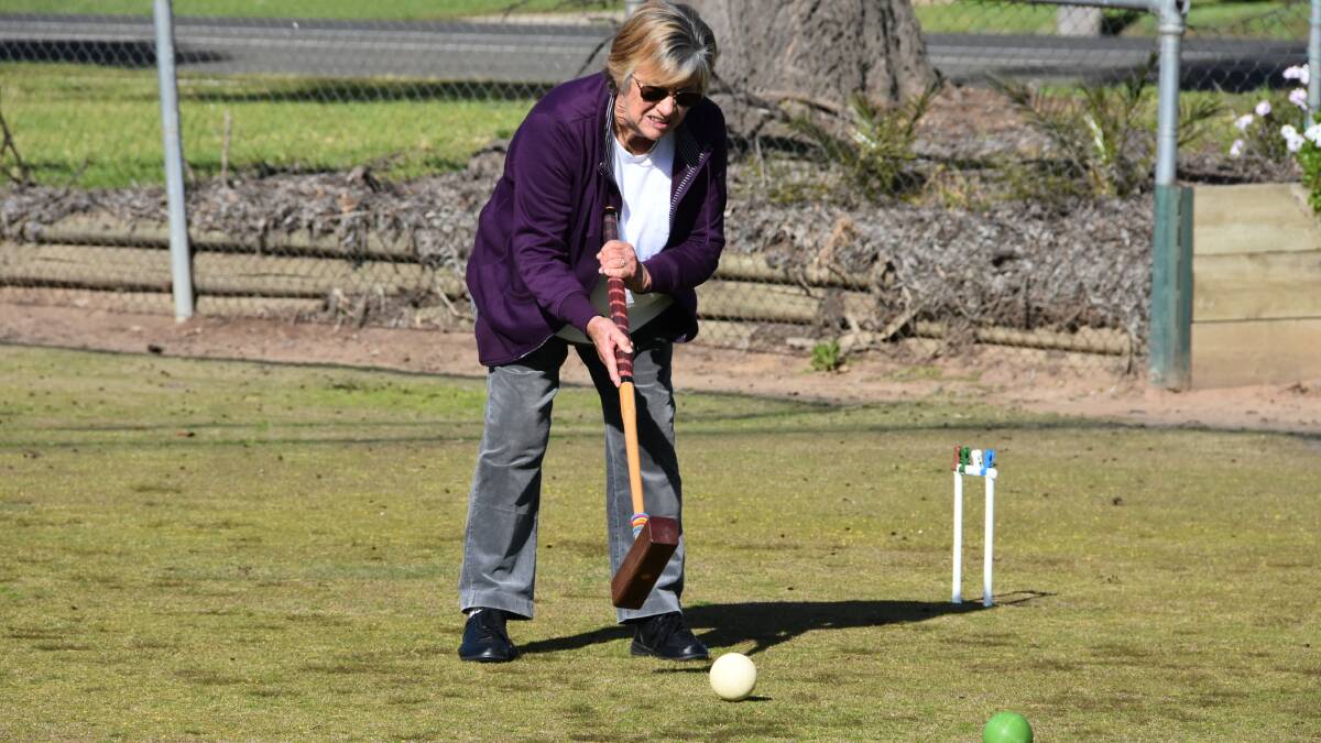 Heather Edwards took on Helen Bryant at croquet this week. File photo.