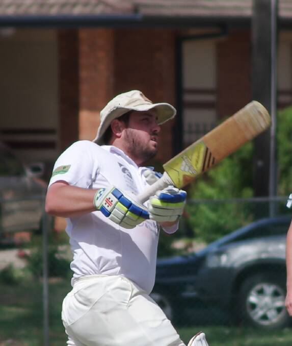 Michael Curtale watches as he sends another delivery to the boundary in Cowra's Grinsted Cup win over Molong on Sunday. Curtale was the star with both bat and ball in Sunday's Cup defence.