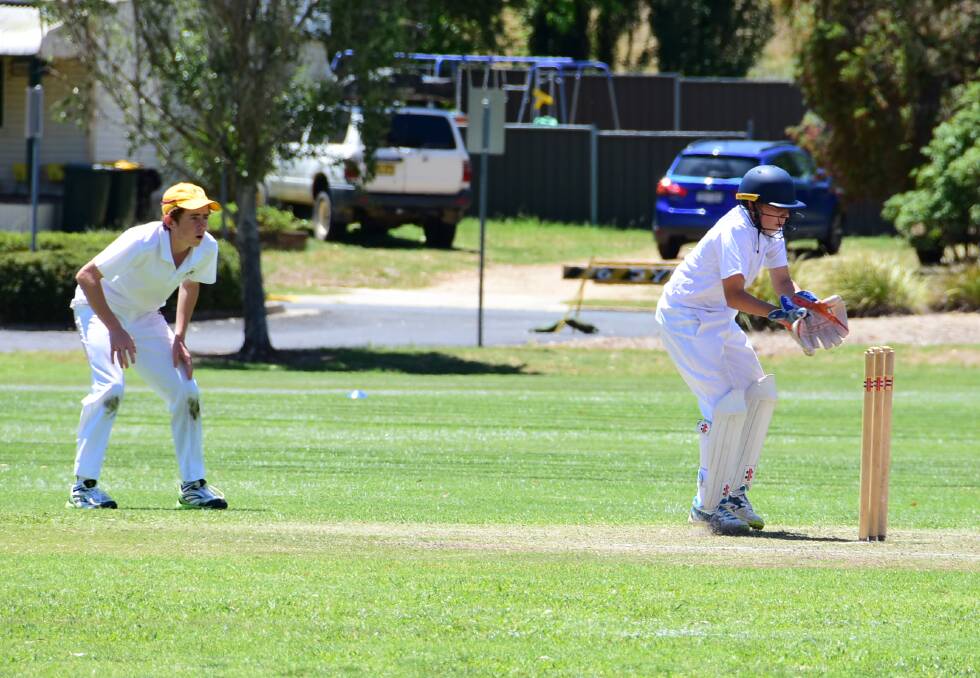 Keeper Mickey McNamara and Darcy Callaghan in the slips, wait for a catch in the Under 16s match against Mitchell on Sunday.