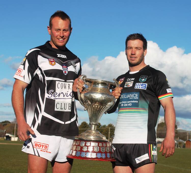 Cowra Magpies skipper Josh Rainbow and Bathurst Panthers captain coach Doug Hewitt with the Group 10 1st grade Premiership trophy The Western Challenge Cup. Photo by Peter Clarke.