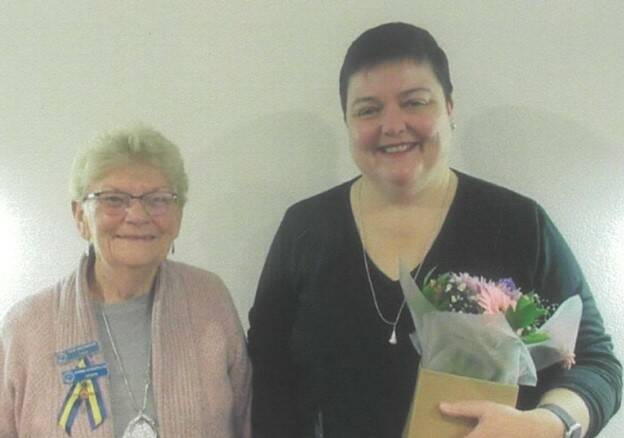 Sandra Anthony-Cox presented guest speaker Donna Rygate with a box of flowers as a thank you gift. Photo contributed.