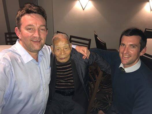 THE ARM OF RECONCILIATION: Matthew Cusack (left) with Tim Cusac (right) with Japanese prisoner of war Teruo Murakami.