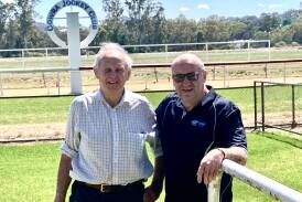 Cowra Jockey Club committee man David Payten who has acted as the club vet since the 1970s with jockey club president Peter Ford.