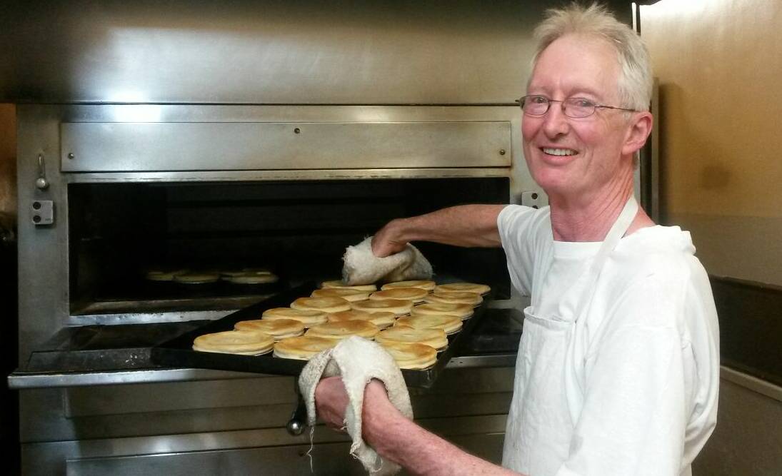 Pictured with a tray of freshly baked meat pies,
fifth generation baker Wayne Lynch is retiring 
after a 40-year stint at the Royce's Bakery.
