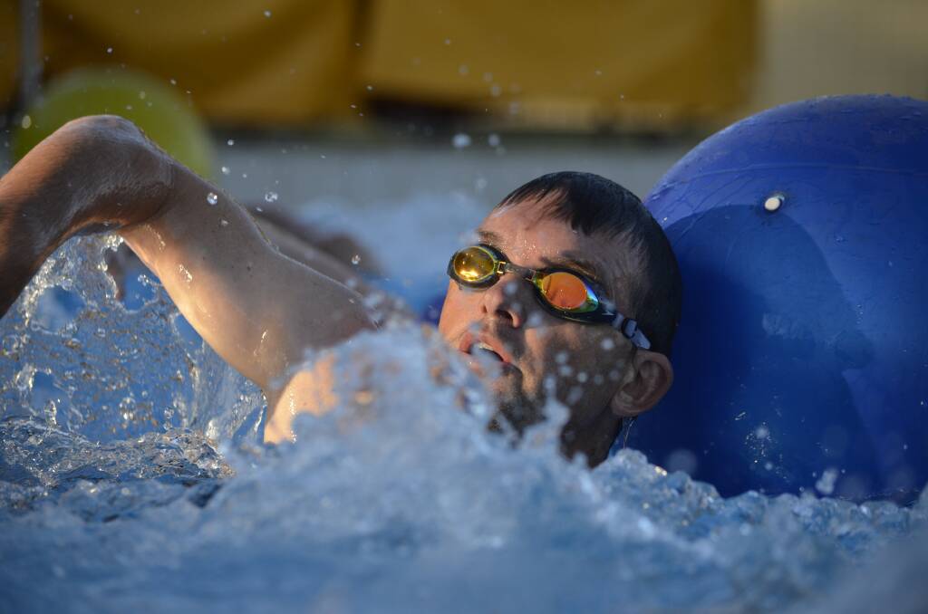 Cowra's Dave Porter competing in the swim lag of a triathlon event at the Cowra Aquatic Centre.