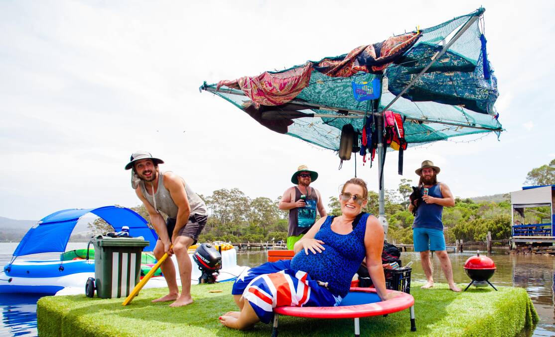 Howzat a floating backyard. Merimbula local Chelsea Grabham with her inventive mates Mick and Phil Jacob relax on deck while Jake Webster has a hit of cricket. Photo: Rachel Mounsey