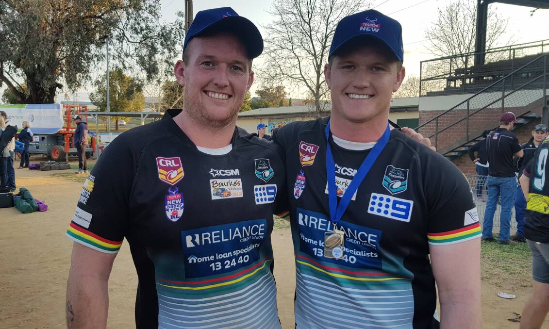 BROTHERS IN ARMS: Brent and Blake Seager celebrate their premiership win on Sunday, which the former was named man-of-the-match in. Photo: MATT FINDLAY
