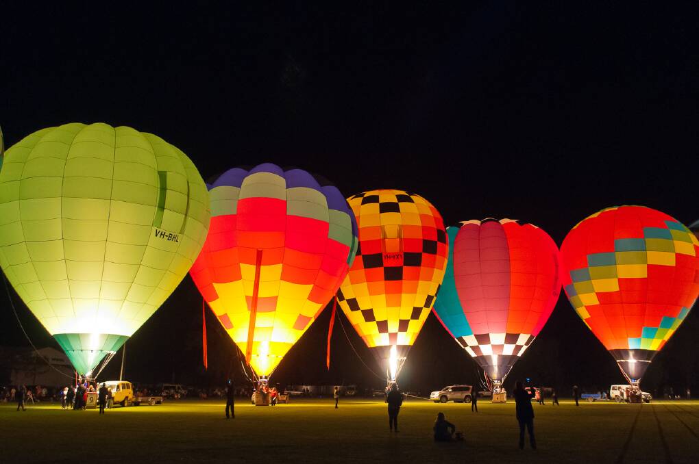 Lights, burners, action: The balloon glow is something you should "experience", balloonist Adam Barrow said. Photo: Federation Fotos