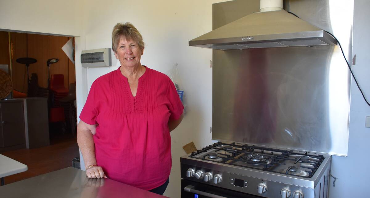 Gooloogong Log Cabin Committee Treasurer Carolyn Noble in the Cabin's current kitchen area, which will be refurbished thanks to a $100,000 grant from the State Government's Heritage Fund. 