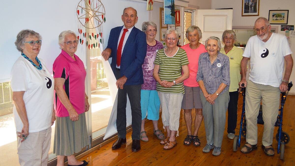 Cowra Mayor, Cr Bill West with members of the Cowra and District Senior Citizens Club Inc. and their new roller blinds at the Senior Citizens Hall which were purchased through Councils Community Grants Program. 