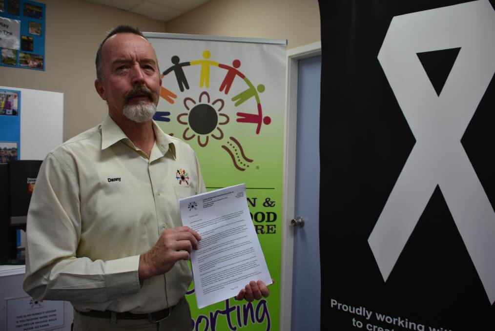 Cowra Information and Neighbourhood staff member Danny Jackett with his letter of concern in regards to the NDIS and Commonwealth Home Support Program. 