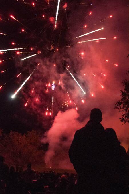A couple enjoying the Wyangala Dam Bonfire and Fireworks Spectacular. Photo: Meg French