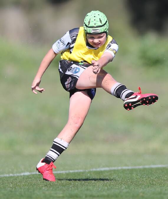 Nate Gunn in action for the Under 11s Magpie side who are through to their grand final. Photo: PHIL BLATCH