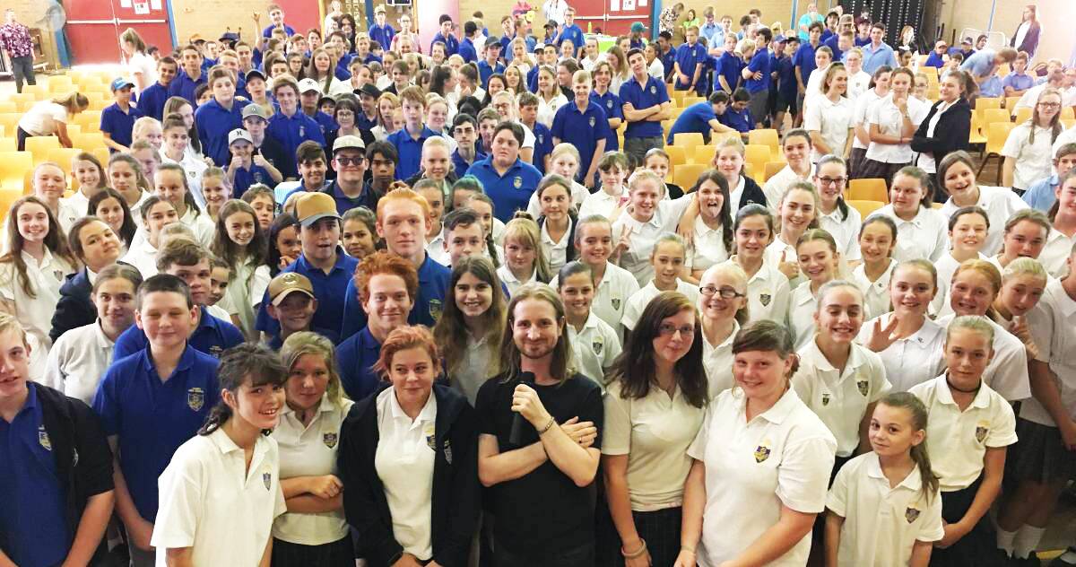 Cowra school students pictured with mental health advocate Nic Newling. 