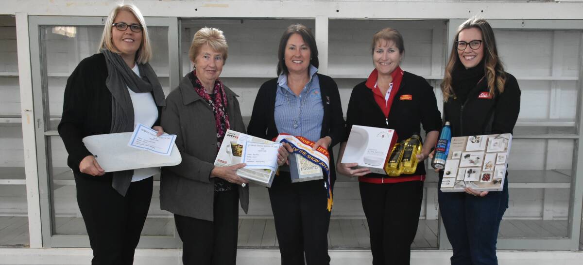 Sharon Spolding, Faye Amos, Gayle Newton, Ros Thompson and Nicole Spolding have taking part in the Cowra Show for decades as stewards and in sections. 