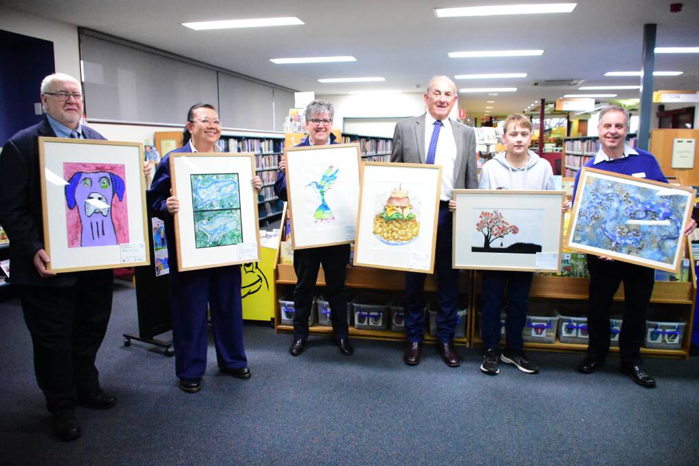 Brian Langer, Mia Chong, Pauline Rowston, Cr Bill West, Monty Ryan and Don Reid with the art works presented to Cowra Hospital.