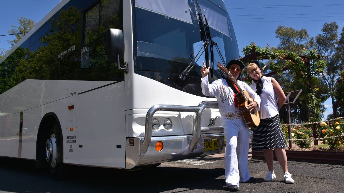 Elvis (Andrew Grinter) with a swinging 50's chick (Sharon Downey) get set to jump on board the bus to the Parkes Elvis Festival last year. 