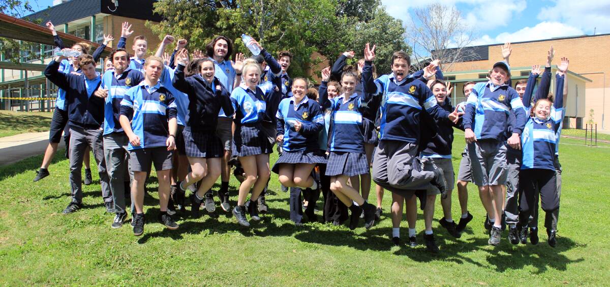 Year 12 students from Cowra High School celebrate the end of their first English exam on Thursday afternoon. 