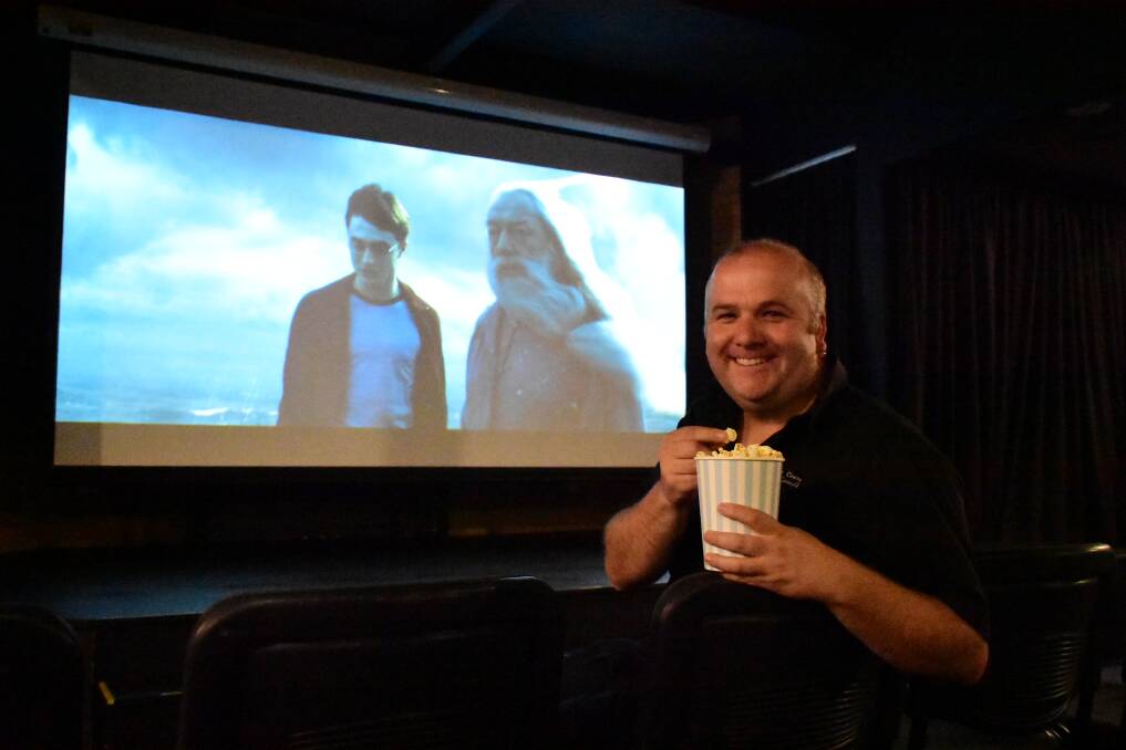 Cowra Civic Centre manager Jonathan Llewellyn enjoying the cinema's upgrades. 