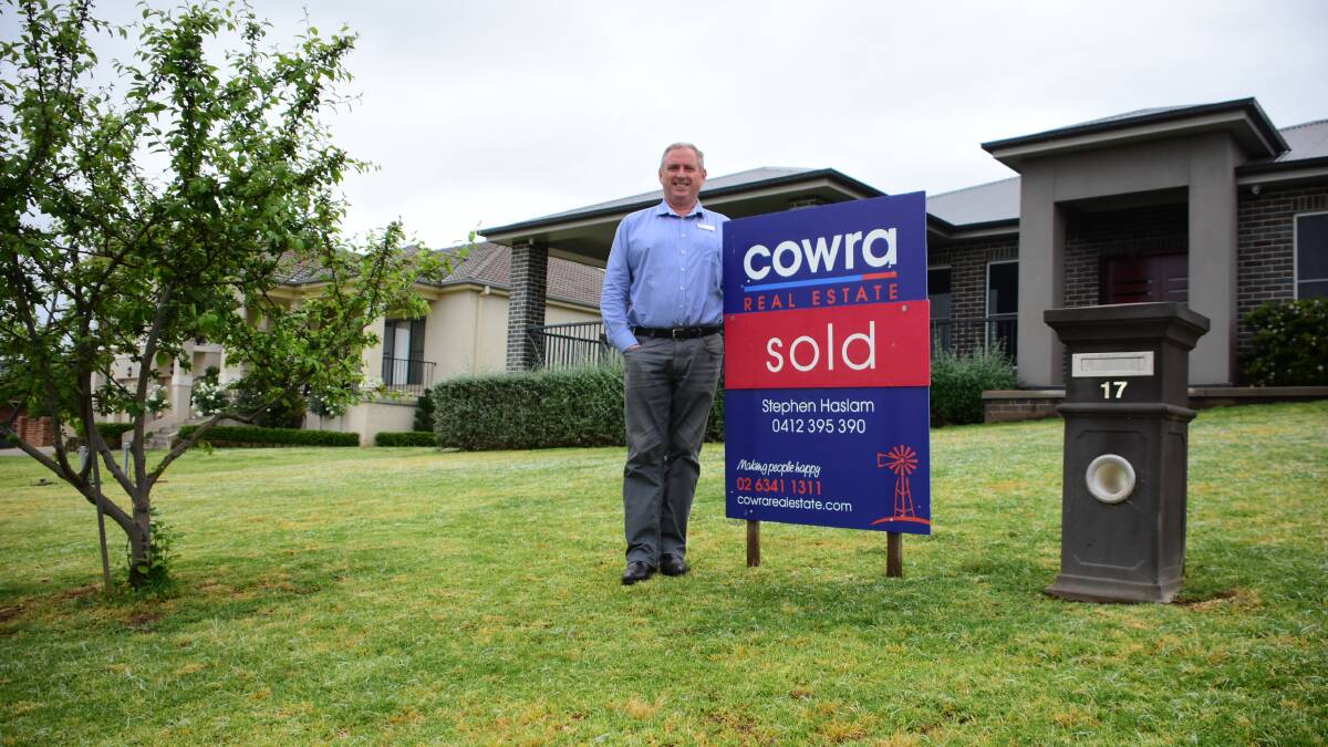 Cowra Real Estate Principal, Stephen Haslam in front of the record breaking house. 