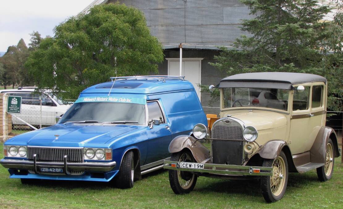 A Classic 1978 Holden HZ panel van and Vintage 1928 Ford Model 'A' on display. 