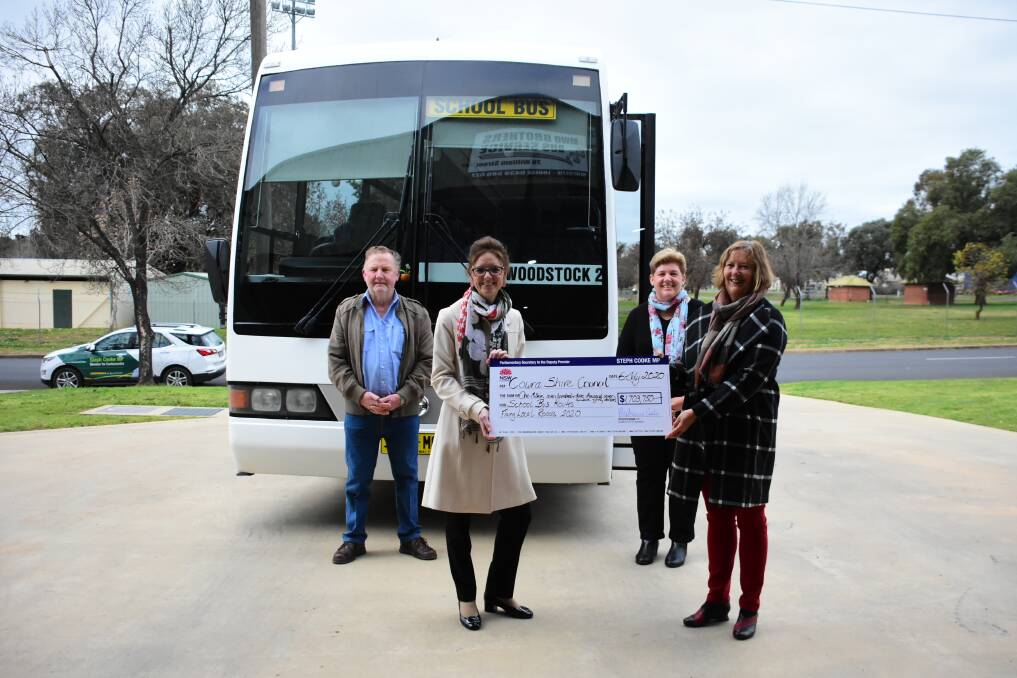 From left - Phillip Dowd, Steph Cooke, Louise Sutherland and Councillor Judi Smith with a check for $1.7 million from the Fixing Local Roads funding program. 