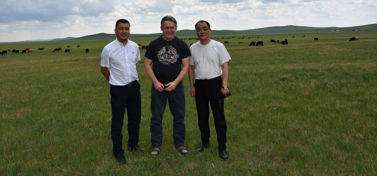 Jiangang Hao, manager of one of the 29 beef stations in the Chinese beef system, Professor David Hopkins and Professor Xin Luo. 