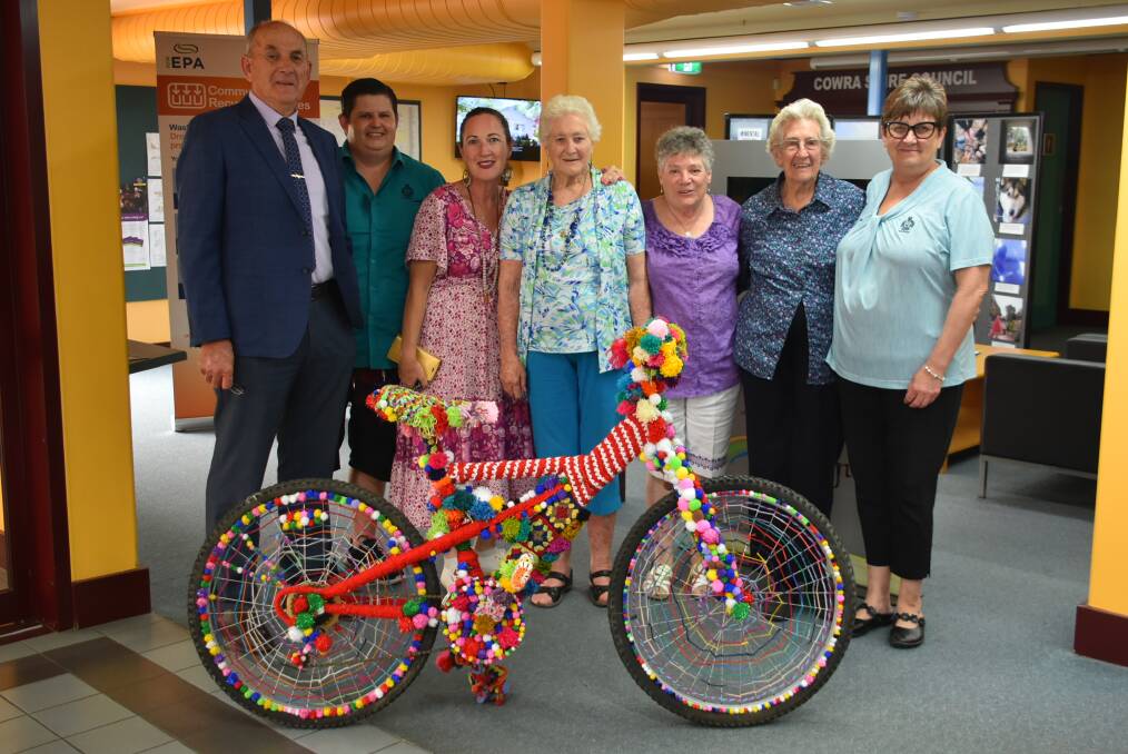 Staff and residents from Bilyara with Cowra Mayor, Councillor Bill West and the upcycled, yarn-bombed bicycle. Photo: Kelsey Sutor