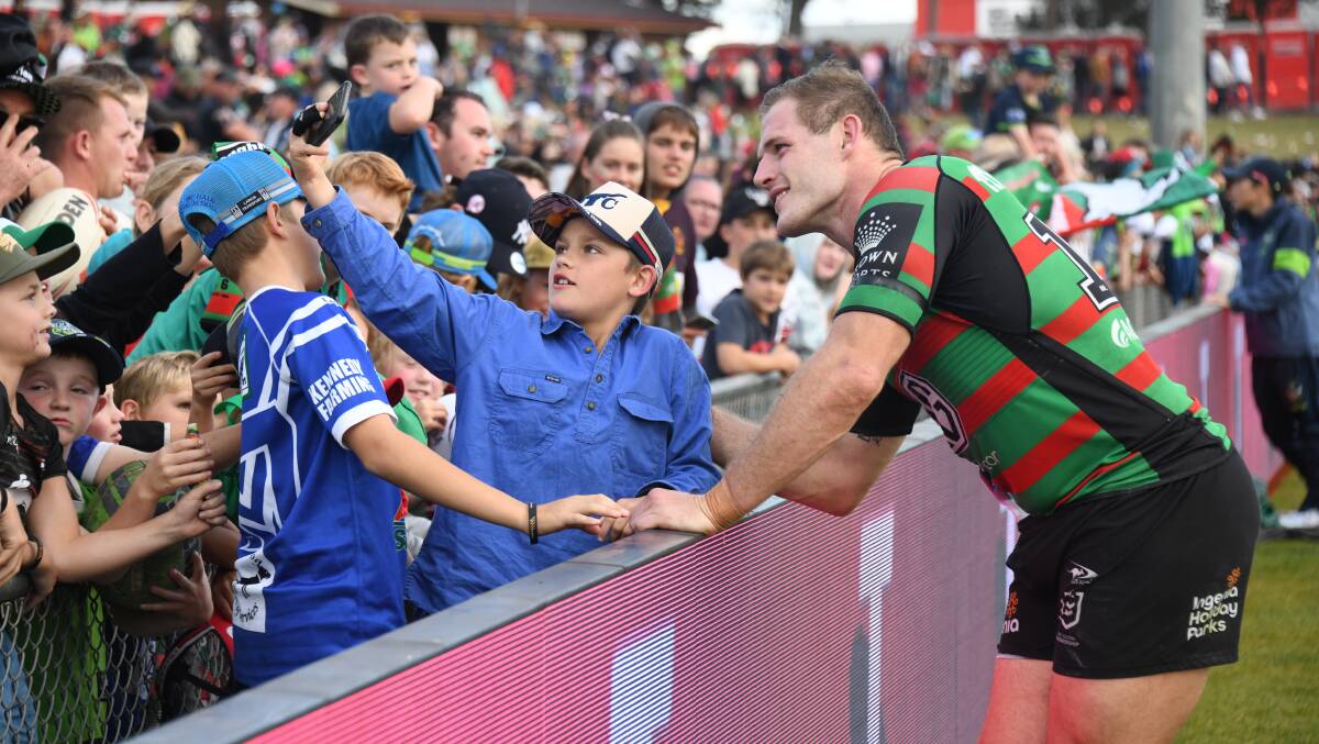 George Burgess and his Rabbitohs teammates spent plenty of time with fans after the NRL match at Dubbo last month. Picture: Amy McIntyre