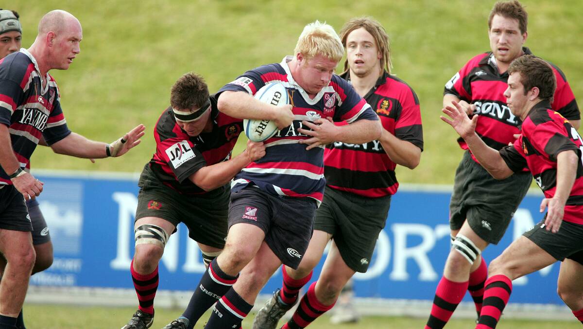 Dave Oliver, centre, playing for Easts in Sydney's competition in 2005.