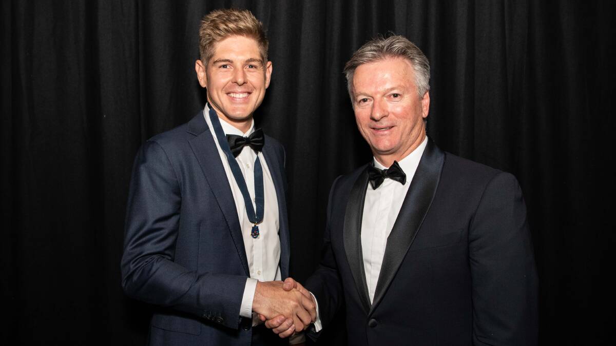 Steve Waugh presents the Steve Waugh Medal to Cowra cricketer Daniel Hughes at the Cricket NSW awards night. Photo: Cricket NSW